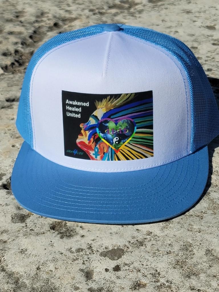4Gratitude trucker cap — Awakened Healed United logo patch on blue and white hat